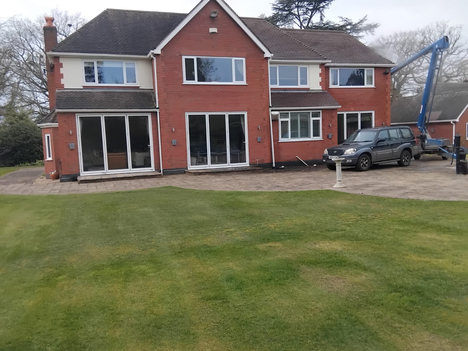 Full exterior house wash — brickwork and windows
