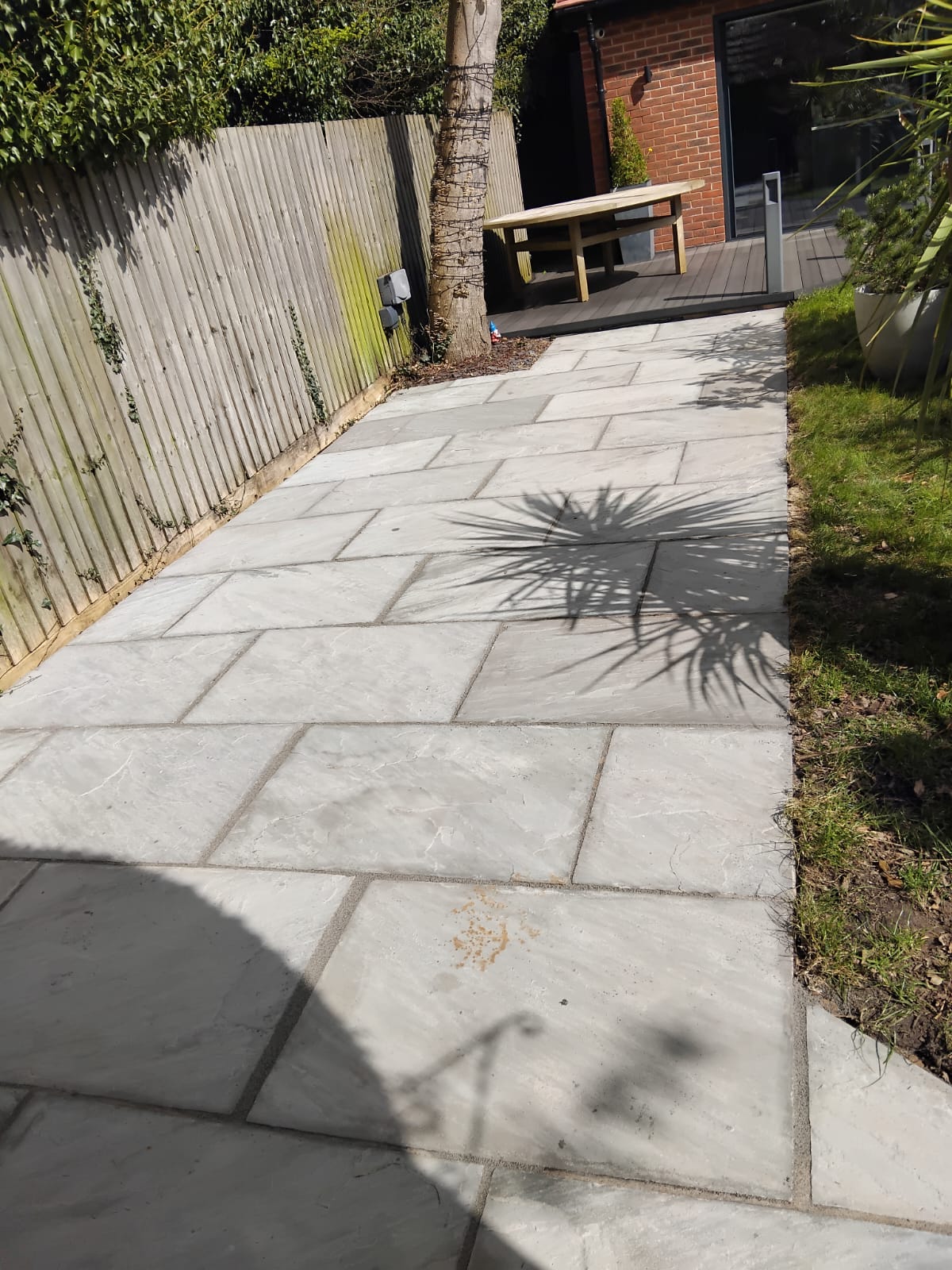Sandstone pathway pressure washed back to natural stone